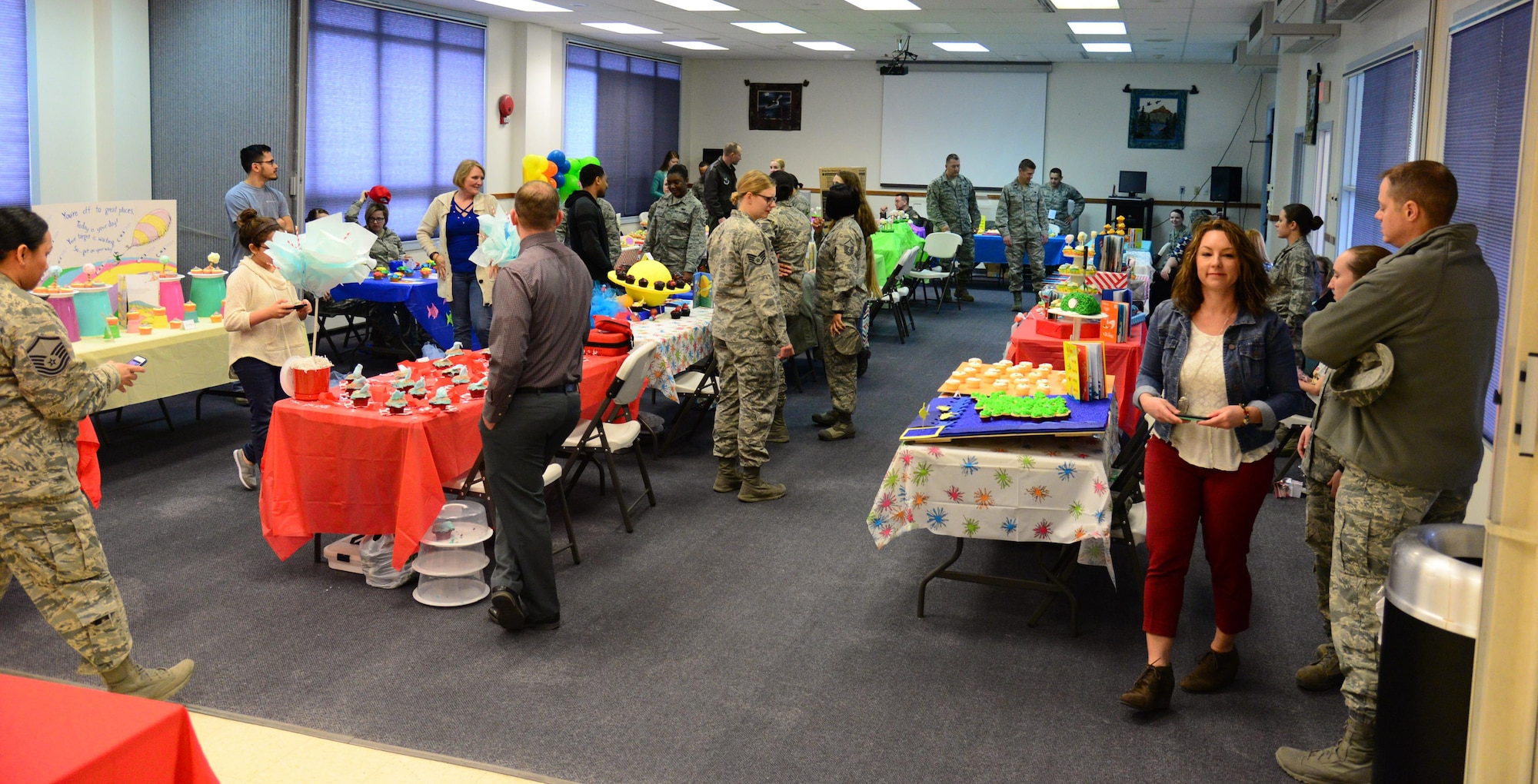 Spectators and competitors gather at the 341st Missile Wing’s first cupcake war held April 3, 2017, at Malmstrom Air Force Base, Mont.  The event was attended by approximately 100 Airmen and their families both as spectators and competitors. (U.S. Air Force photo/Senior Airman Magen M. Reeves)