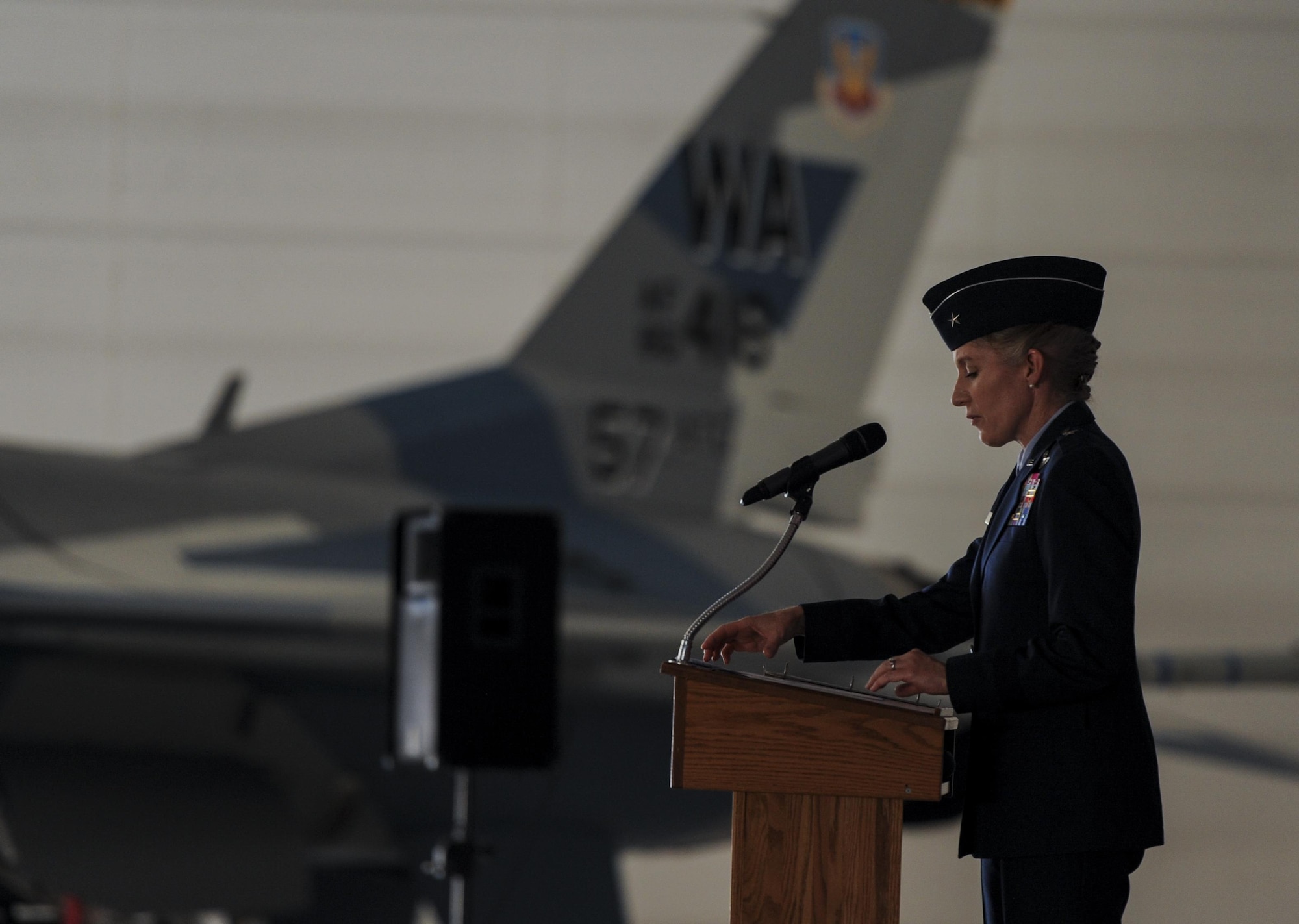 Brig. Gen. Jeannie Leavitt, 57th Wing commander, Nellis Air Force Base, Nev., speaks at a change of command for 57th Adversary Tactics Group, August 5, 2016. General Leavitt entered the Air Force in 1992 after earning her bachelor’s degree in aerospace engineering from the University of Texas and her master’s degree in aeronautics and astronautics from Stanford University. (U.S. Air Force photo by Airman 1st Class Kevin Tanenbaum)