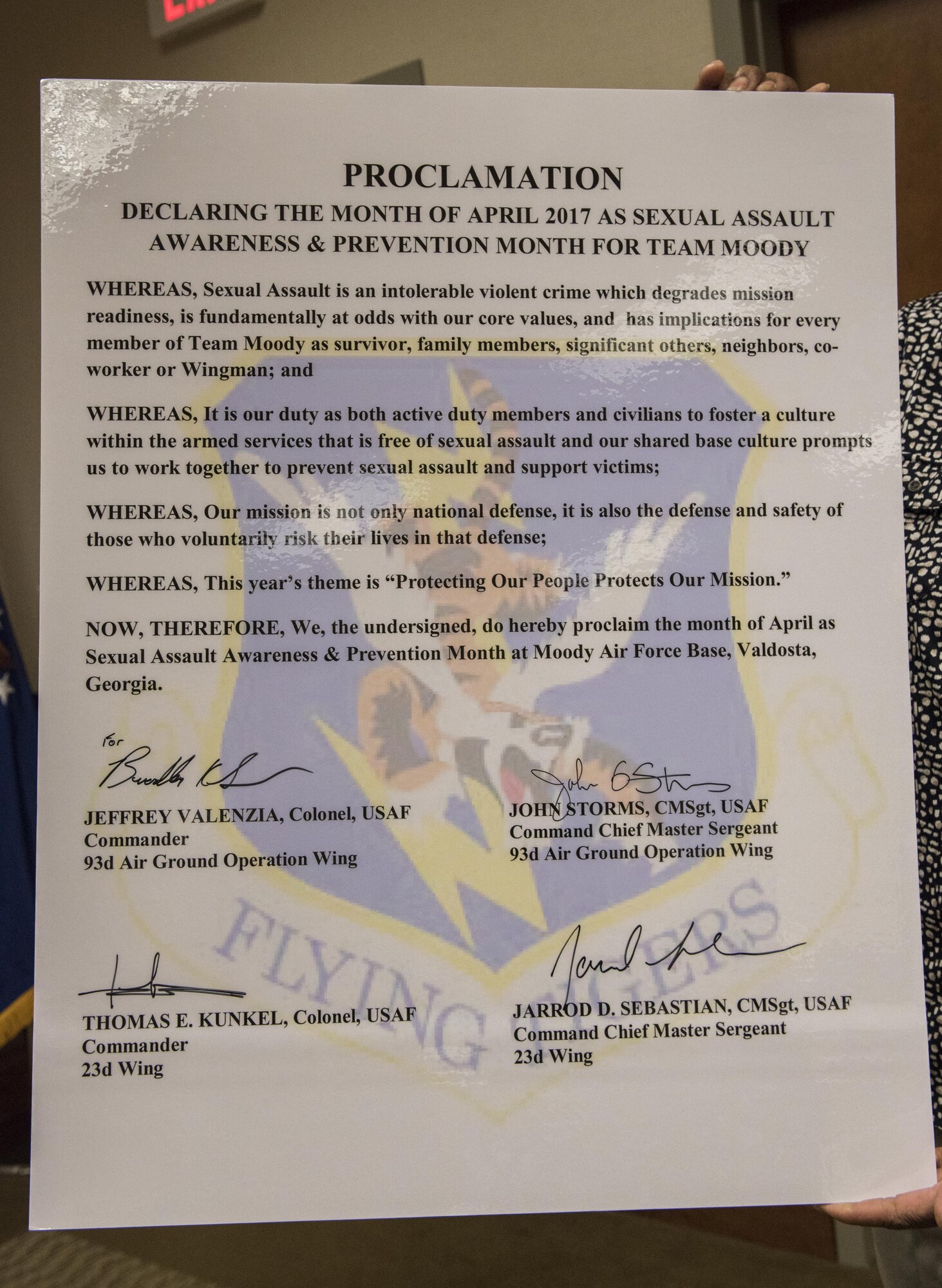 Florine King, Sexual Assault Prevention and Response program manager, displays a proclamation, March 20, 2017, at Moody Air Force Base, Ga. The proclamation was signed to declare the month of April 2017 as SAPR month for Team Moody. This year’s theme for SAPR month is “Protecting our people protects our mission.” (U.S. Air Force photo by Airman 1st Class Lauren M. Sprunk)
