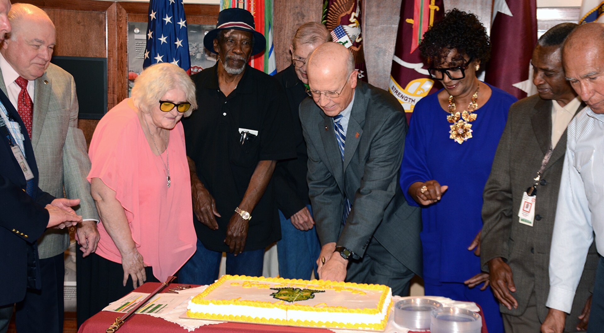 Mr. Charles G. (Gregg) Stevens, SES, Army Medicine Civilian Corps Chief, along with some of the longest serving members of the Civilian Corps, cut a cake celebrating the 21st anniversary of the corps. The Army Medical Department Civilian Corps was established on March 26, 1996.