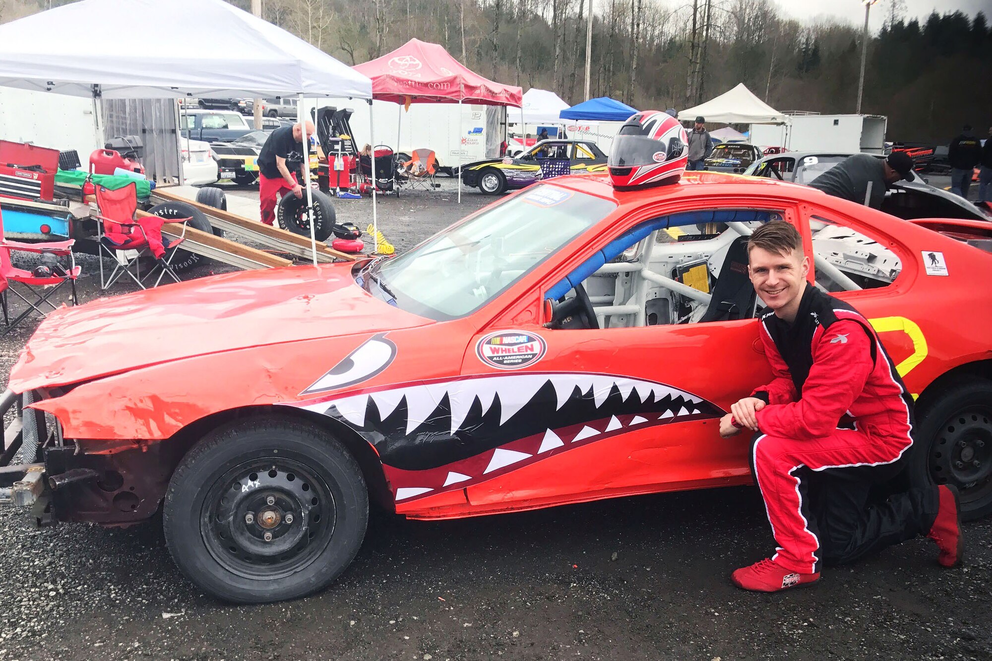 Airman 1st Class Sabatino DiMascio, 62nd Aircraft Maintenance Squadron communication/navigation mission systems specialist, poses with his hornet race car, April 1, 2017 at the Evergreen Speedway in Washington. DiMascio developed an appreciation for Air Force history during his time in the Civil Air Patrol and painted his hornet as an homage to the A-10 aircraft. (Courtesy Photo)