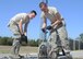 U.S. Air Force Airman Connor Smith (left) and Airman 1st Class Tristan Richard (right), 325th Communication Squadron radio frequency transmission systems technicians, inspect three miles of audio cables vital to carrying signals down the length of the Tyndall flightline for the 2017 Gulf Coast Salute air show and open house at Tyndall Air Force Base, Fla., March 22, 2017. Both Airmen are part of a small team responsible for providing audio to an estimated crowd of 150,000 visitors. (U.S. Air Force Airman 1st Class Delaney Rose/Released)