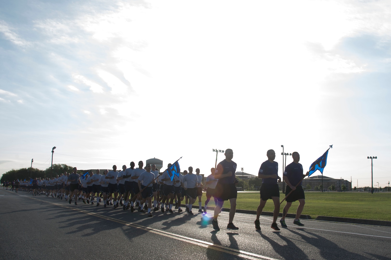 Participants in the 324th Training Squadron’s inaugural Knights Day 5K run in formation at the starting line on the 324th TRS physical training pad at Joint Base San Antonio-Lackland, Texas, March 25, 2017. Knight’s Day, a day 324th TRS commander Lt. Col. Sammuel Berenguer designated to honor the legacy and lineage of the squadron and its mascot, the Knight, is a celebration not just of a knight’s bravery and combat skills, but also honor, dignity and social justice. 