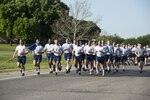 Trainees from the 324th Training Squadron run in formation during the squadron’s inaugural Knight’s Day 5K at the 324th TRS at Joint Base San Antonio-Lackland, Texas, March 25, 2017. Trainees ran alongside their military training instructors and senior leadership. 