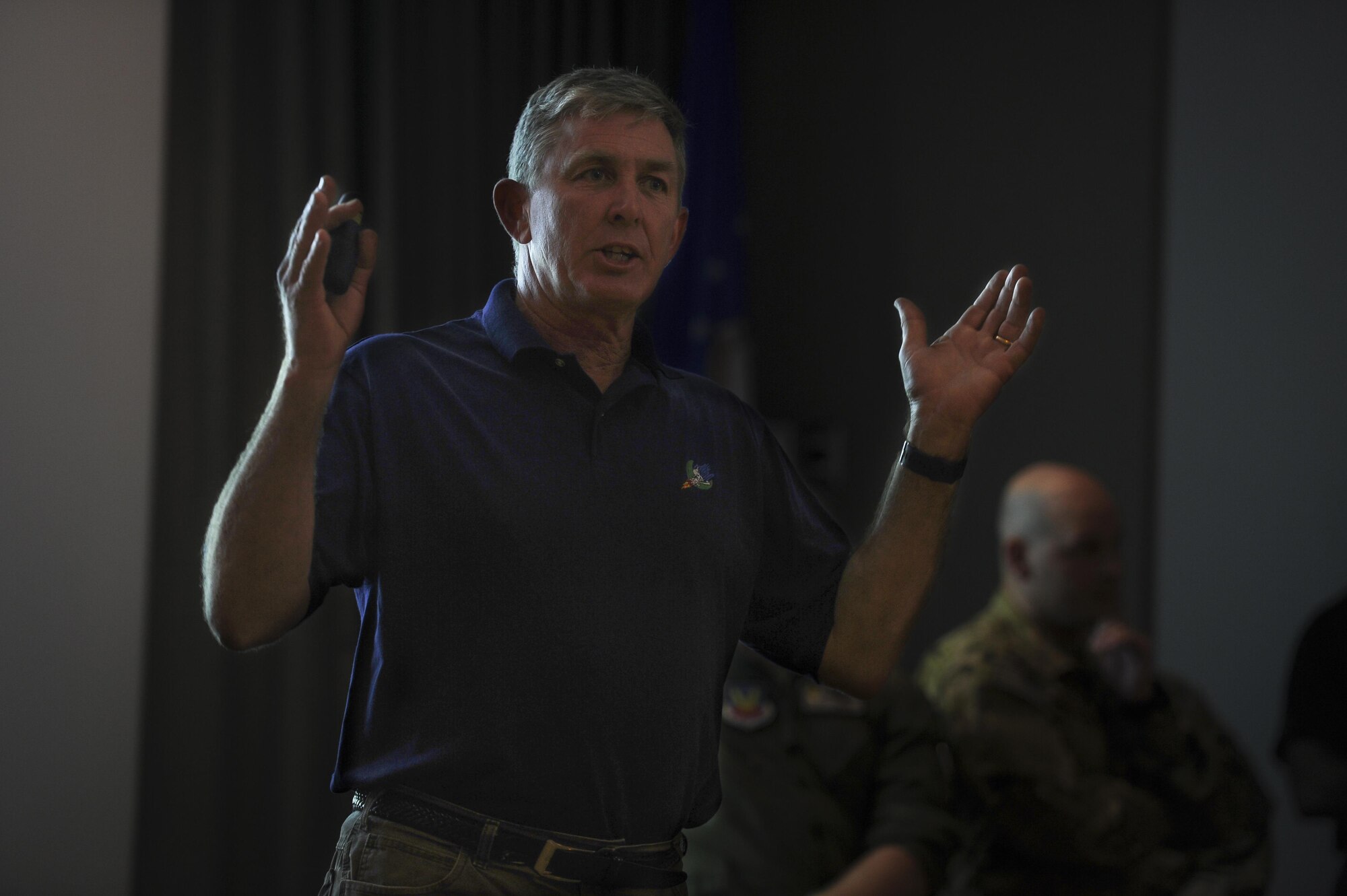 Bill Walters, a program analyst with Air Force Special Operations Command, speaks during the celebration of the 50th Anniversary of the AC-130 at Hurlburt Field, Fla., March 31, 2017. The 4th Special Operations Squadron celebrated the 50th anniversary of the AC-130's Air Force career by sharing a brief history of the aircraft, hosting a barbecue and a facilitating a tour of the AC-130J Ghostrider gunship. (U.S. Air Force photo by Airman 1st Class Dennis Spain)