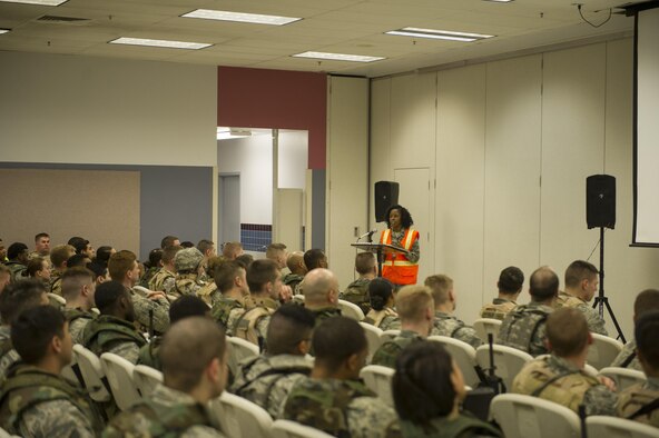 U.S. Air Force Capt. Victoria Honey, a 354th Fighter Wing Staff Judge Advocate assistant staff judge advocate, gives a legal brief to Airman who are simulated deploying in support of exercise Arctic Gold 17-5, April 4, 2017, at Eielson Air Force Base, Alaska. During the brief Honey went over the Law of Armed Conflict and some of the services available to Airman who are simulated deploying and their families. (U.S. Air Force photo by Airman 1st Class Isaac Johnson)
