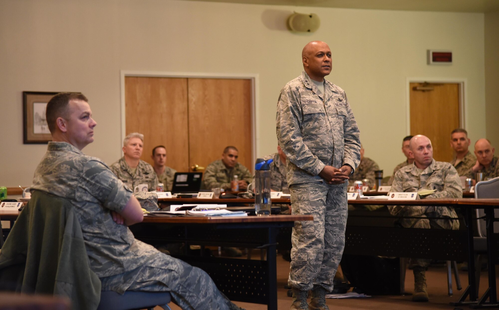 Maj. Gen. Anthony Cotton, 20th Air Force and Task Force 214 commander, watches a leadership clip during the 20th AF Senior Leader Conference on F.E. Warren Air Force Base, Wyo., March 30, 2017. Cotton empowered squadron commanders in attendance to innovate within their units and share ideas on how to take care of their Airmen. The 20th AF SLC focused on revitalizing the squadron as a core fighting unit, a major focus area of Gen. David L. Goldfein, Air Force Chief of Staff.  (U.S. Air Force photo by Glenn Robertson)