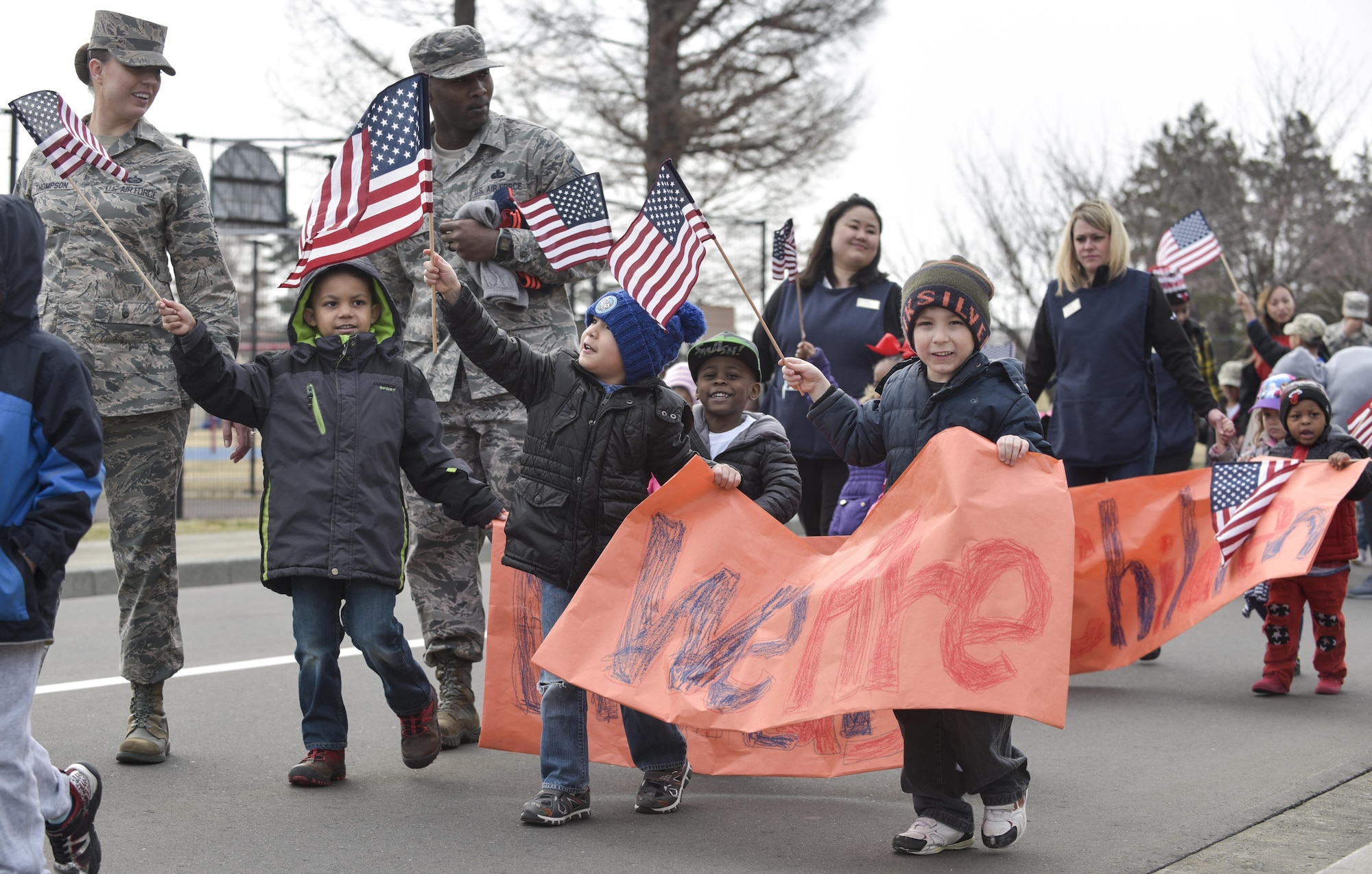 Children, parents and staff from the Yoiko Child Development Center walk in the Month of the Military Child parade at Misawa Air Base, Japan, April 3, 2017. Throughout the month of April, the CDC will host events including Friday luncheons, making letters and pictures for deployed service members along with various spirit and themed days. (U.S. Air Force photo by Staff Sgt. Melanie A. Hutto)