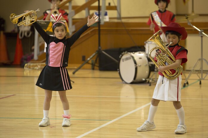 Japanese students from the Shunan International Children’s Club perform during the Japanese Cultural Exchange Program at Marine Corps Air Station Iwakuni, Japan, March 20, 2017.  The Shunan International Children’s Club traveled to the air station to give the students an opportunity to experience Japanese singing, dancing and martial arts. (U.S. Marine Corps photo by Pfc. Stephen Campbell)