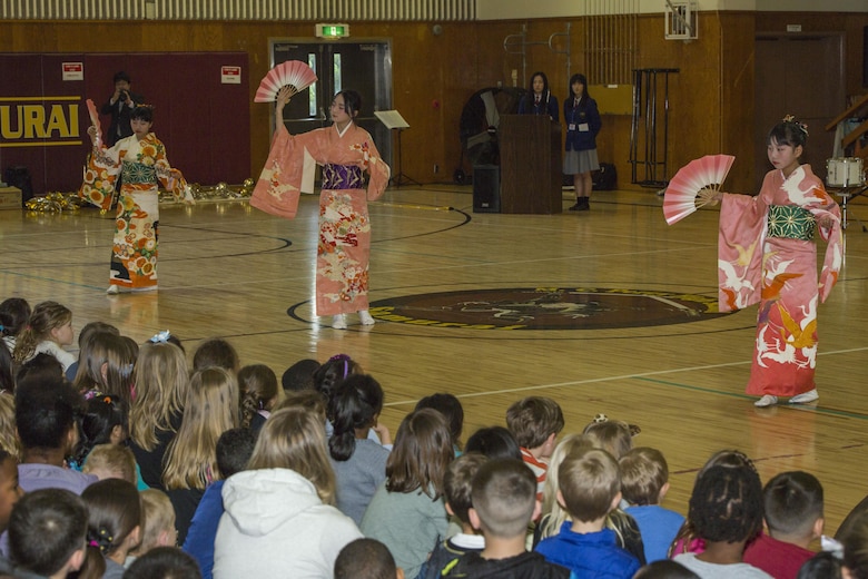 Japanese children from the Shunan International Children’s Club perform the “Sakura Dance” during the Japanese Cultural Exchange Program at Marine Corps Air Station Iwakuni, Japan, March 20, 2017. The “Sakura Dance” is a traditional dance depicting the season of cherry blossoms in Japan and demonstrates their unique culture. (U.S. Marine Corps photo by Pfc. Stephen Campbell)