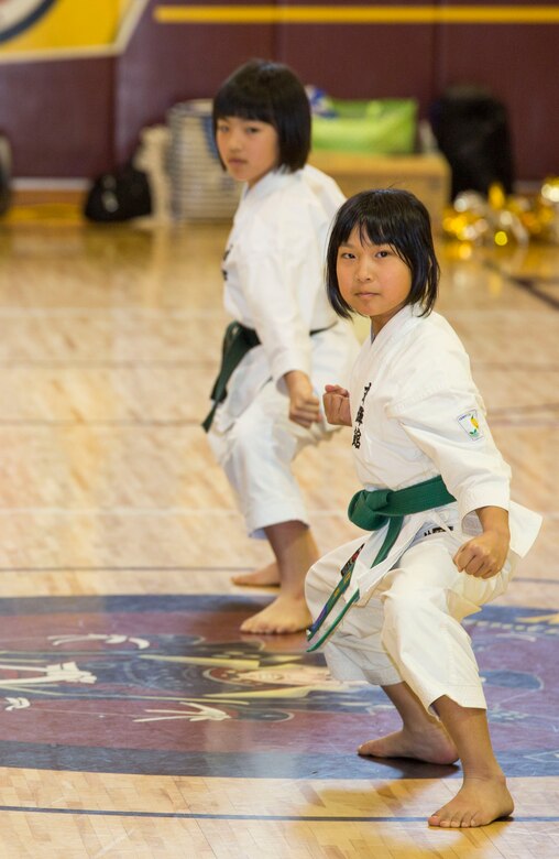 Japanese children from the Shunan International Children’s Club demonstrate karate during the Japanese Cultural Exchange Program at Marine Corps Air Station Iwakuni, Japan, March 20, 2017. The Shunan International Children’s Club traveled to the air station to give the students an opportunity to experience Japanese singing, dancing and martial arts. (U.S. Marine Corps photo by Pfc. Stephen Campbell)