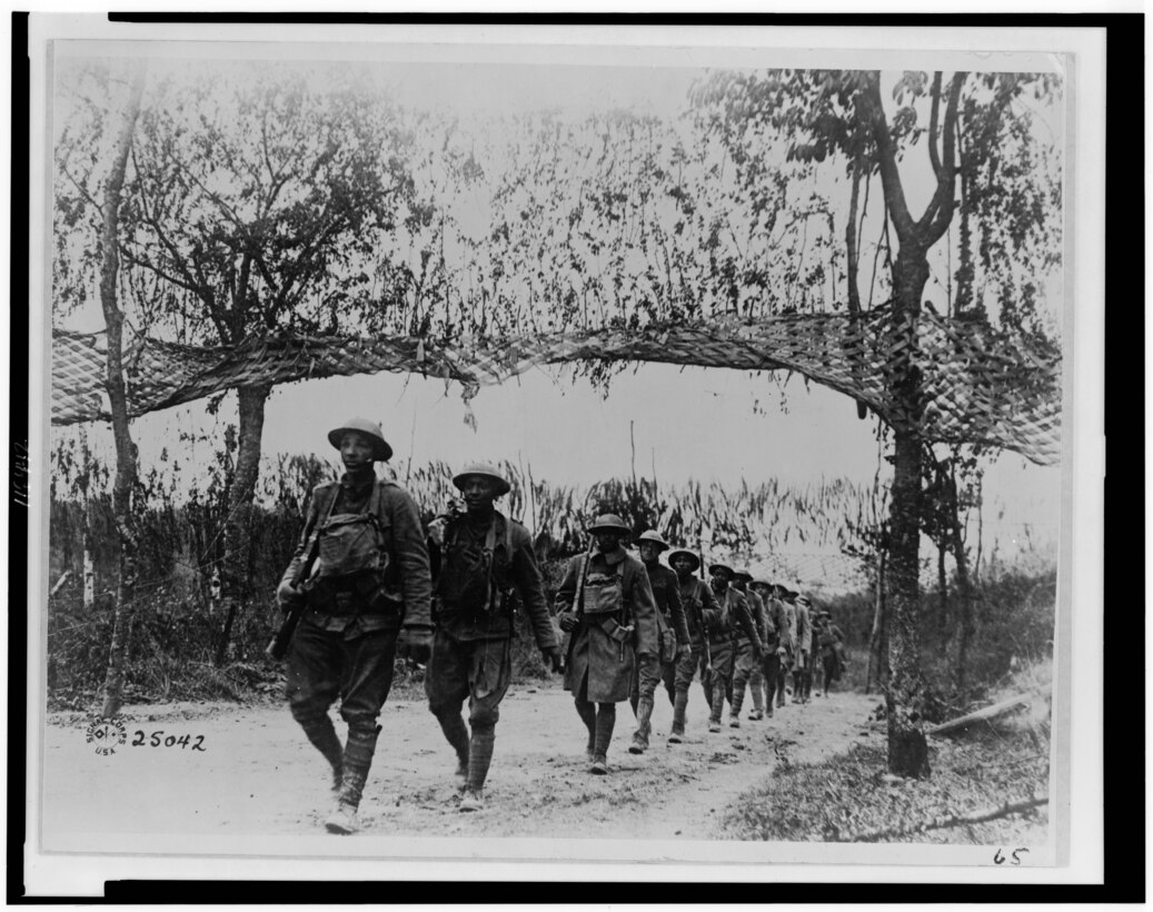Members of an African-American unit of Army infantry troops march northwest of Verdun, France, Nov. 5, 1918. Library of Congress photo
