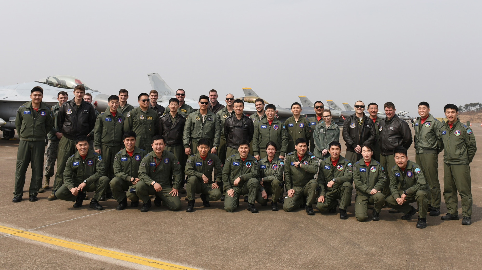 U.S. Air Force and Republic of Korea Air Force members pose for a photo at Seosan Air Base, Republic of Korea during Buddy Wing 17-3, March 30, 2017. This training is a Buddy Wing exercise, a regularly-scheduled exercise that occurs several times a year. It is based on realistic tactical requirements and missions expected of our ROK-U.S. combined and joint forces assuming various threats. (Courtesy photo)