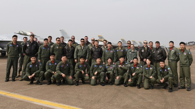 U.S. Air Force and Republic of Korea Air Force members pose for a photo at Seosan Air Base, Republic of Korea during Buddy Wing 17-3, March 30, 2017. This training is a Buddy Wing exercise, a regularly-scheduled exercise that occurs several times a year. It is based on realistic tactical requirements and missions expected of our ROK-U.S. combined and joint forces assuming various threats. (Courtesy photo)