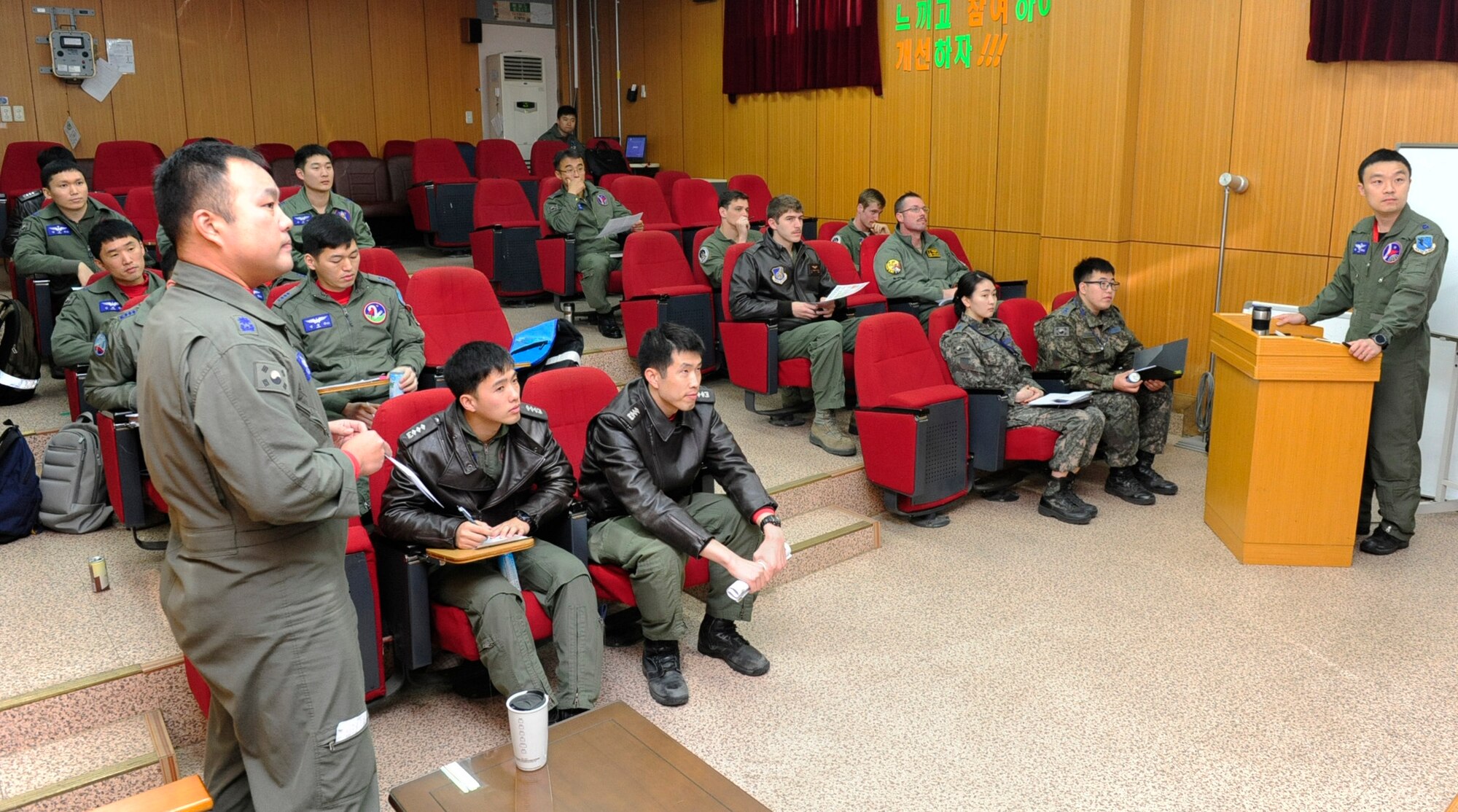 U.S. Air Force and Republic of Korea Air Force pilots attend a briefing at Seosan Air Base, Republic of Korea during Buddy Wing 17-3, March 30, 2017. Combined exercises, like Buddy Wing, reinforce the ROK-U.S. alliance and demonstrates one of many alliance capabilities available for the defense of the Republic of Korea. (U.S. Air Force photo/Staff Sgt. Chelsea Sweatt)