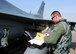 U.S. Air Force Maj. Michael Mullin, 80th Fighter Squadron director of operations, goes over a preflight checklist at Seosan Air Base, Republic of Korea during Buddy Wing 17-3, March 30, 2017. Buddy Wing exercises are conducted multiple times throughout the year to sharpen interoperability between U.S. and ROK forces. (U.S. Air Force photo/Staff Sgt. Chelsea Sweatt)