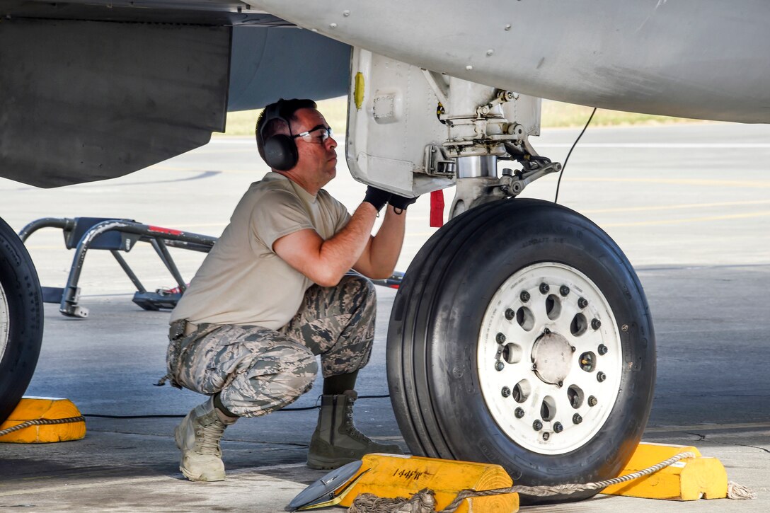 California Air National Guard Staff Sgt. Orlado Martinez performs preflight checks on an F-15C Eagle during Sentry Aloha 17-03 at Joint Base Pearl Harbor-Hickam, Hawaii, March 30, 2017. Martinez is a crew chief assigned to the California Air National Guard’s 44th Aircraft Maintenance Squadron. Air National Guard photo by Senior Master Sgt. Chris Drudge