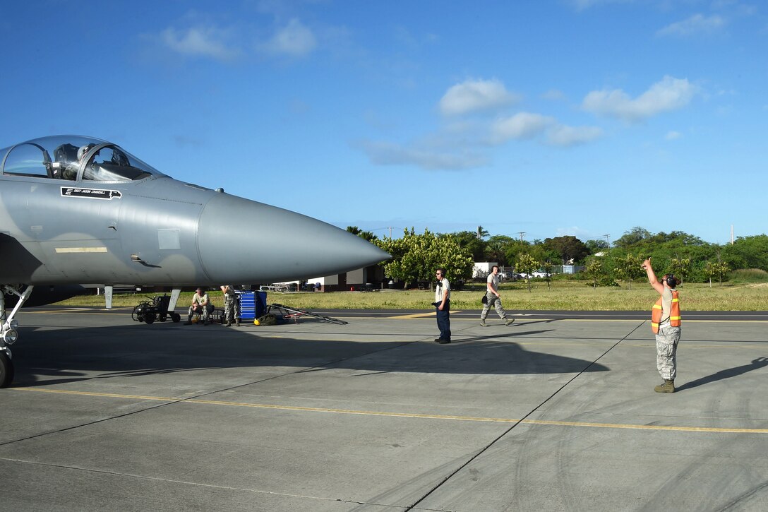 California Air National Guard Tech. Sgt. Melissa Hernandez, right, supervises end-of-runway checks on an F-15C Eagle during exercise Sentry Aloha 17-03 at Joint Base Pearl Harbor-Hickam, Hawaii, March 30, 2017. Hernandez is a crew chief assigned to the California Air National Guard’s 44th Aircraft Maintenance Squadron. Air National Guard photo by Senior Master Sgt. Chris Drudge