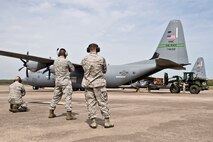 A competition team from the 96th Aerial Port Squadron practices an Engines Running On-Load/Off-Load (ERO) of a C-130J Super Hercules during the Unit Training Assembly (UTA) weekend April 2, 2017, at Little Rock Air Force Base, Ark. The team will be competing in this year’s Port Dawg Challenge, which includes tests of speed, safety and accuracy in an assortment of situations common to aerial porters. (U.S. Air Force photo by Master Sgt. Jeff Walston/Released)