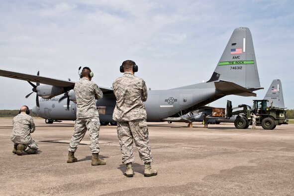 A competition team from the 96th Aerial Port Squadron practices an Engines Running On-Load/Off-Load (ERO) of a C-130J Super Hercules during the Unit Training Assembly (UTA) weekend April 2, 2017, at Little Rock Air Force Base, Ark. The team will be competing in this year’s Port Dawg Challenge, which includes tests of speed, safety and accuracy in an assortment of situations common to aerial porters. (U.S. Air Force photo by Master Sgt. Jeff Walston/Released)