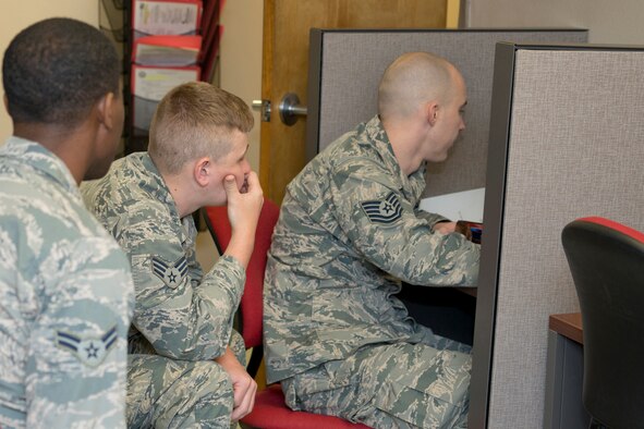 U.S. Air Force Reserve Airmen assigned to the 913th Maintenance Squadron take an opportunity to check for travel vouchers and pending orders during the Unit Training Assembly weekend April 1, 2017, at Little Rock Air Force Base, Ark. Deployments, short term orders and training take Airmen around the world. (U.S. Air Force photo by Master Sgt. Jeff Walston/Released)