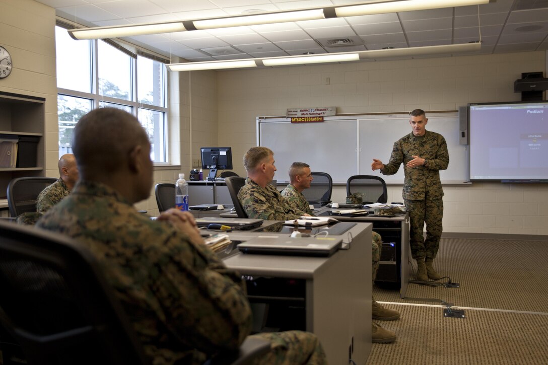 U.S. Marine Corps Brig. Gen. Jason Q. Bohm, commanding general of Training Command, addresses Marines of Marine Corps Combat Service Support Schools (MCCSSS) during his visit to Camp Johnson, N.C., March 1, 2017. Brig. Gen. Bohm's visit was to observe and discuss how MCCSSS' plans nest with the Training Command Campaign Plan and to review progress on the Leadership Development Program, reading and writing programs, and employment of Force Fitness Instructors. (U.S. Marine Corps photo by Cpl. Laura Mercado)