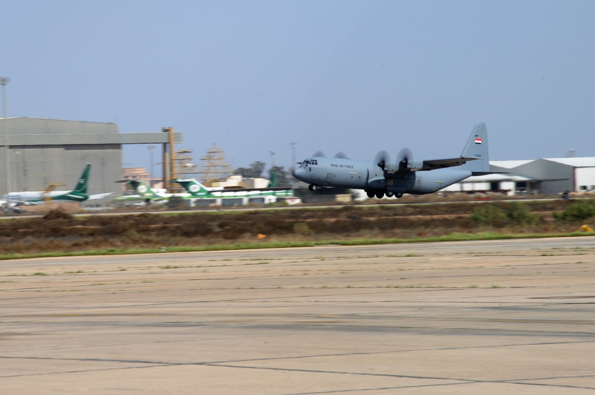 An Iraqi Air Force C-130J Super Hercules takes off from Martyr Muhammad Alaa Air Base, Iraq, March 20, 2017. The aircraft is used by the Iraqi Air Force to transport cargo and personnel downrange in the fight against ISIS. (U.S. Air Force photo/Tech. Sgt. Kenneth McCann)