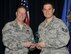 Staff Sgt. Sean Bird (right), a 302nd Airlift Wing reservist assigned to the 302nd Communications Flight, was awarded the 302nd AW NCO of the Fourth Quarter Award by Col. James DeVere, 302nd AW commander, during the Unit Training Assembly, Feb. 12, 2017 here. The other 2016 Fourth Quarter Award winners are: Airman – Senior Airman Douglas Rice, senior NCO – Master Sgt. Jeanette Wilinski, company grade officer – Capt. Katherine Schifani, and field grade officer – Maj. Jami Fernandez. (U.S. Air Force photo/Staff Sgt. Amber Sorsek)