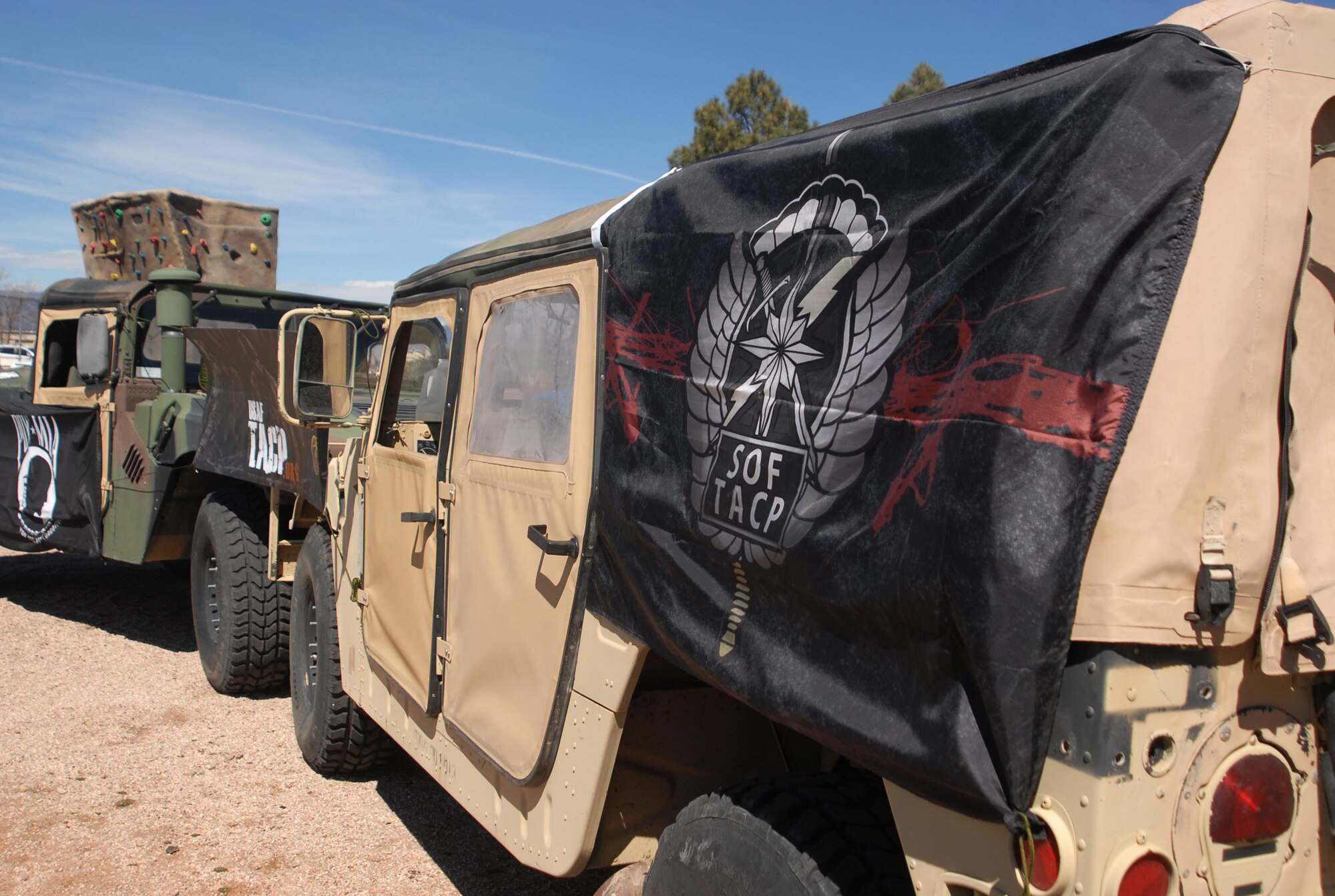 PETERSON AIR FORCE BASE, Colo. — The 13th Air Support Operations Squadron set up vehicles and tents for the sixth annual 24-Hour Challenge run at Peterson Air Force Base, Colo., March 30, 2017. The run is done around the world to honor fallen Tactical Air Control Party Airmen and raise money to help members of the TACP community and their families. (U.S. Air Force photo by Shellie-Anne Espinosa)