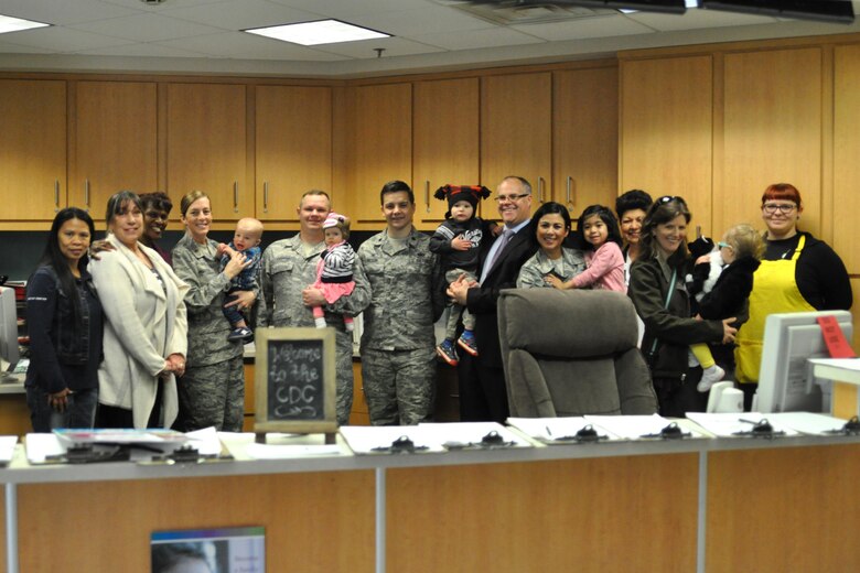 PETERSON AIR FORCE BASE, Colo. – Families and child development center staff gather together to kick off the Month of the Military Child at the Main CDC, April 3, 2017, on Peterson Air Force Base, Colo. The Month of the Military Child was established to highlight the important role children play in the Armed Forces community. (courtesy photo)