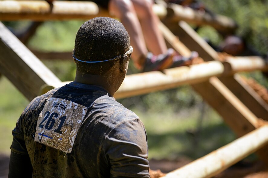 A participant studies an obstacle during the 2017 Defenders of Liberty Mud Run at Barksdale Air Force Base, La., April 1. The event was open to the public and more than 500 competitors, including military members, dependents and civilians attended the race. (U.S. Air Force photo/Senior Airman Mozer O. Da Cunha)