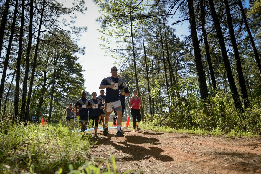 Participants cross the starting line to begin the 2017 Defenders of Liberty Mud Run at Barksdale Air Force Base, La., April 1. More than 500 people ran the four-mile course, braving 20 obstacles designed to test the physical and mental limits, and included wooden structures, multiple rope climbs and mud pits. (U.S. Air Force photo/Senior Mozer O. Da Cunha)