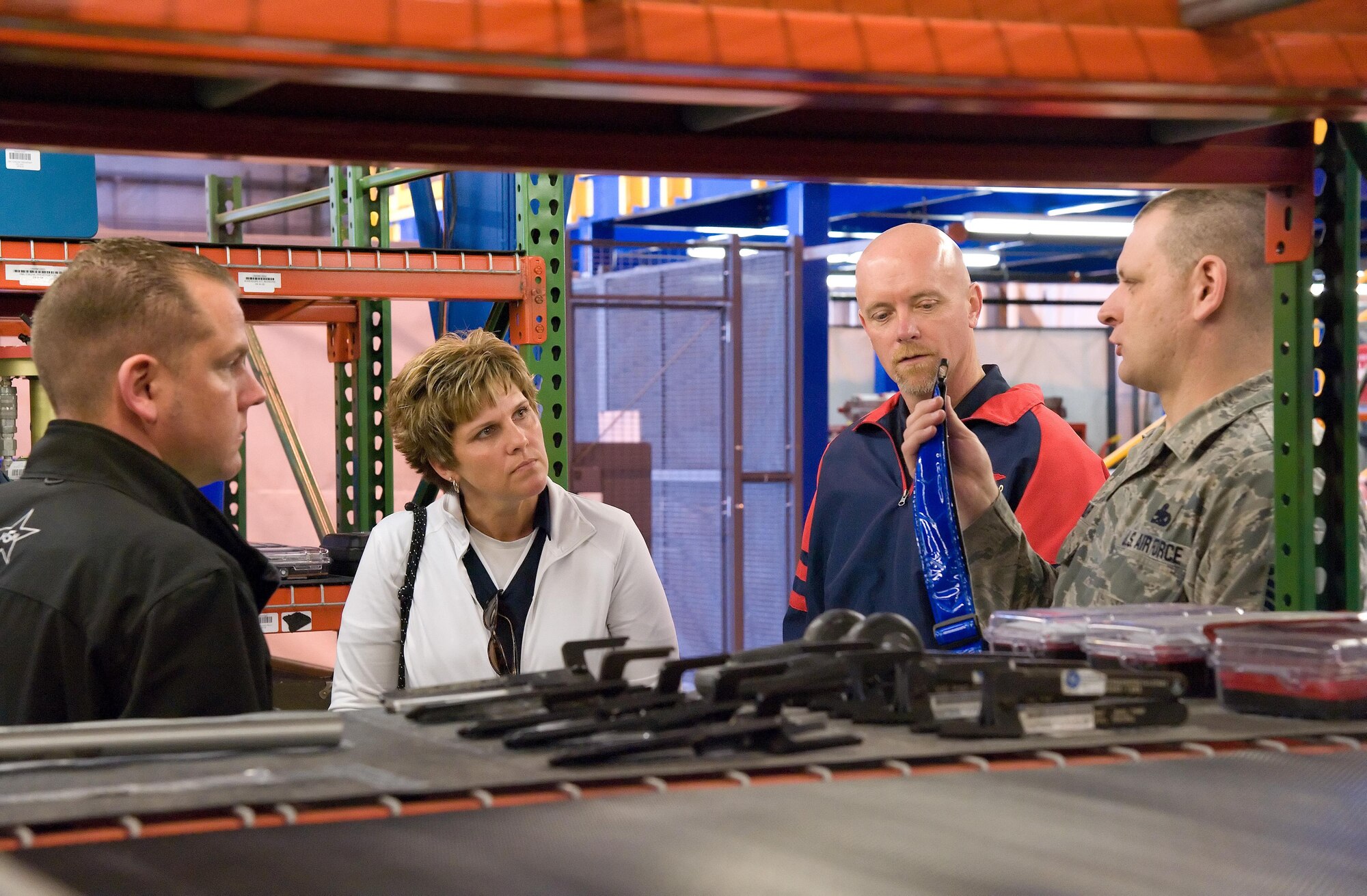 Master Sgt. Stephen Miller, 436th Aircraft Maintenance Squadron consolidated tool krib NCO in charge, explains to Bobby Pancake, 436th Airlift Wing honorary commander; Sandy Caloway, 436th Civil Engineer Squadron honorary commander; and Matt Kaye, guest of Bobby Pancake, how items located in CTK are accounted with the aid of barcodes March 29, 2017, on Dover Air Force Base, Del. Miller told the honorary commanders that items being checked in or out are scanned and can be identified as belonging to Dover AFB’s CTK inventory. (U.S. Air Force photo by Roland Balik)