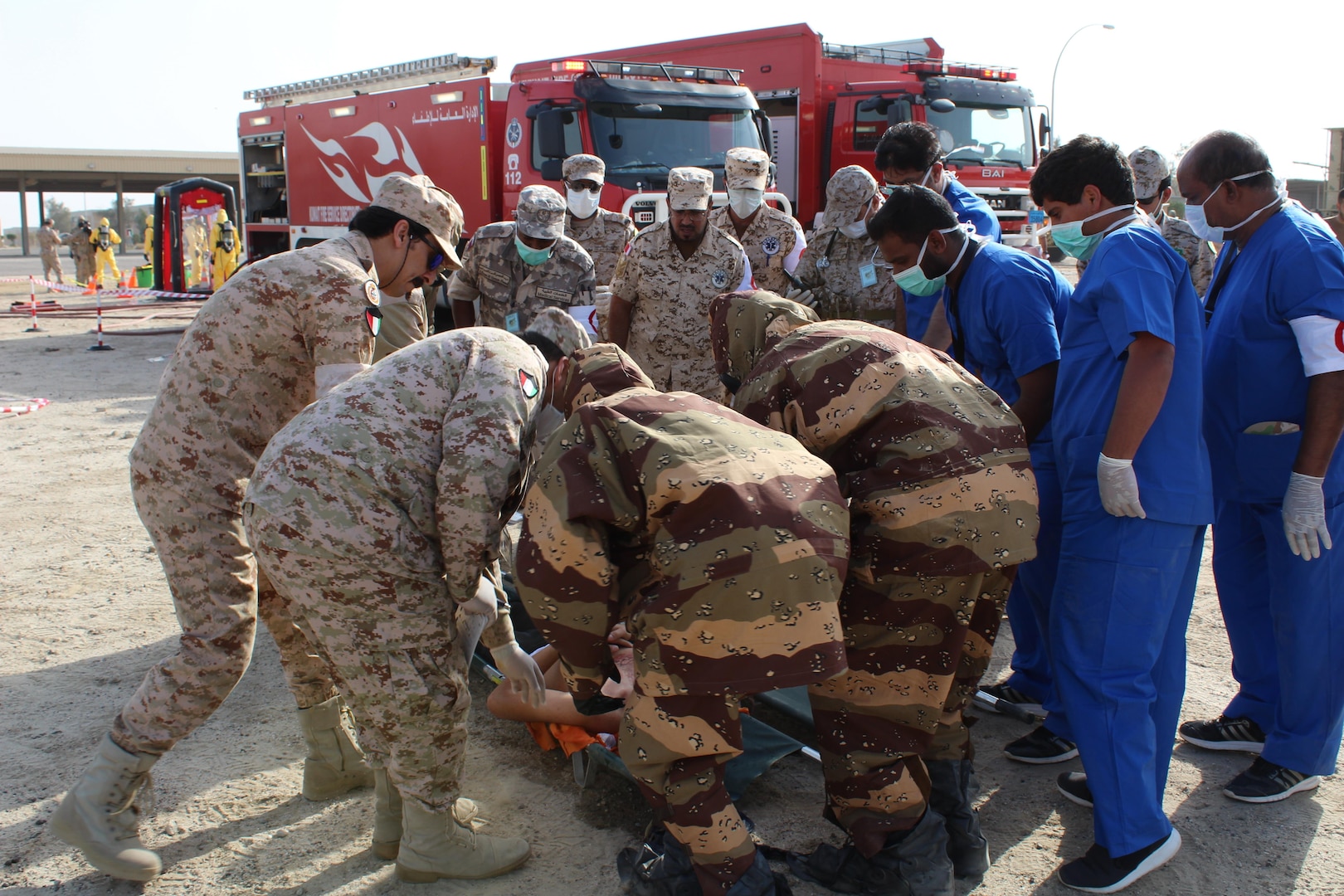 Civilian and military personnel from Gulf Cooperation Council nations and the U.S. conduct chemical, biological, radiological, and nuclear response training as part of exercise Eagle Resolve 17, April 02, 2017, in Kuwait. In this hypothetical scenario, munitions loaded with a mustard gas chemical agent landed near a mosque resulting in 5-10 casualties. After detecting and identifying the chemical agent, response personnel deployed, triaged, evacuated and treated casualties, and secured the area. The exercise tests participant's ability to respond as a combined joint task force. Exercise Eagle Resolve is the premier U.S. multilateral exercise within the Arabian Peninsula. Since 1999, Eagle Resolve has become the leading engagement between the U.S. and Gulf Cooperation Council nations to collectively address the regional challenges associated with asymmetric warfare in a low-risk setting. (Photo by U.S. Army Staff Sgt. Francis O’Brien)