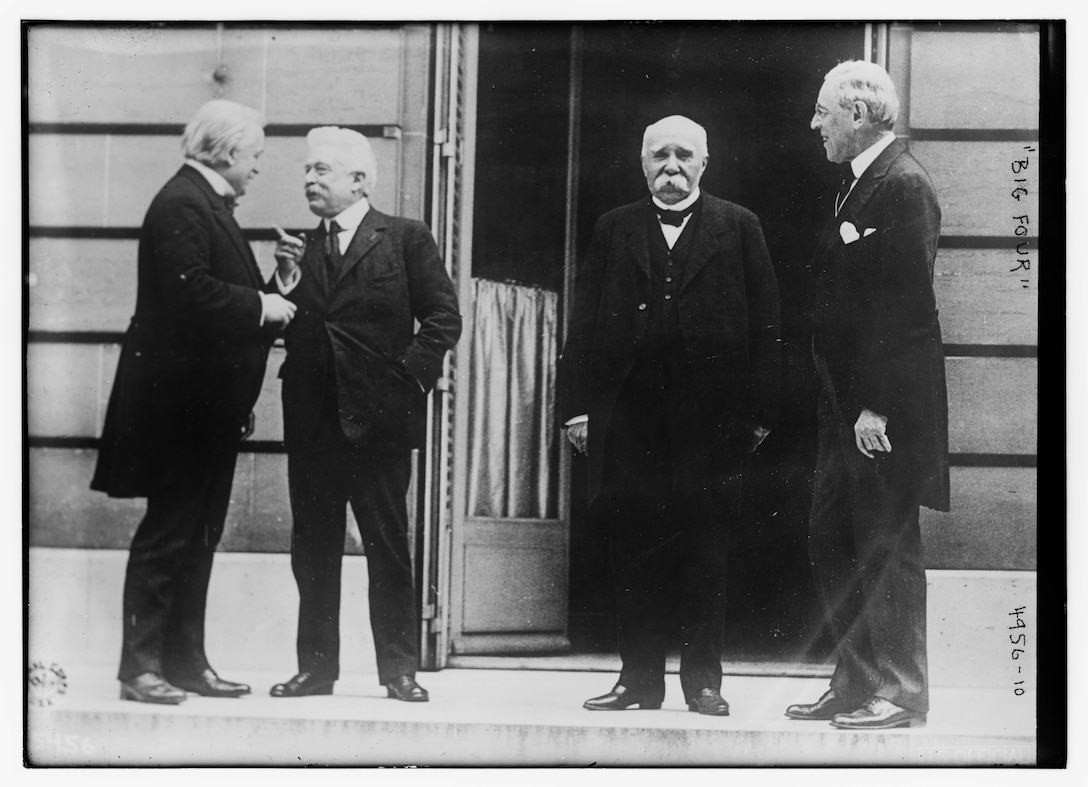 From left, British Prime Minister David Lloyd George, Italian Prime Minister Vittorio Orlando, French Prime Minister Georges Clemenceau and U.S. President Woodrow Wilson -- the "Big Four" world leaders -- attend the Paris Peace Conference, May 27, 1919. Photo by Edward Jackson