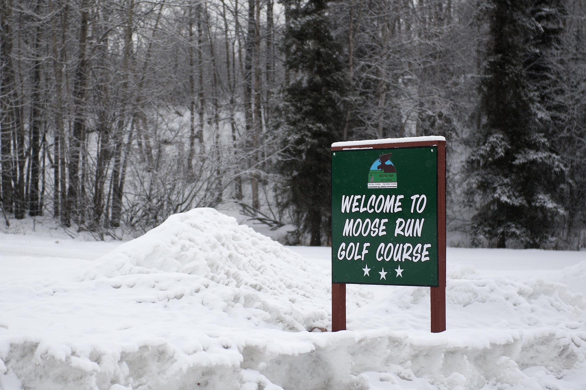 Snow accumulates at Moose Run Golf Course during a late March snowfall, March 28, 2017, Joint Base Elmendorf-Richardson, Alaska.  Due to the accumulation of snow and ice during the winter, the golf season is limited to only 5-6 months. 
