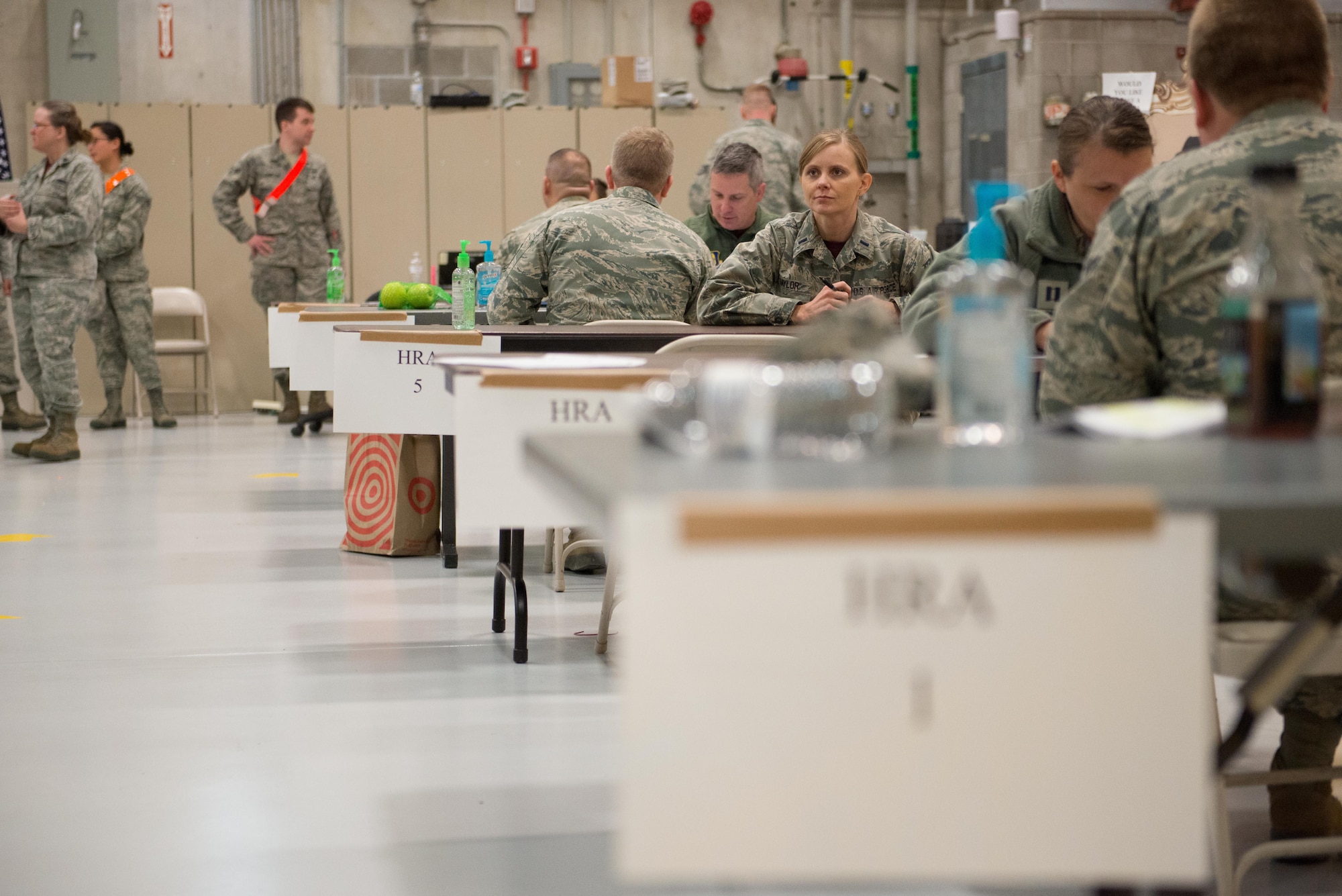 1st Lt. Kristy Saylor, 934th ASTS clinical nurse, waits for a member to arrive at her table during the annual mass physicals on April 2. 