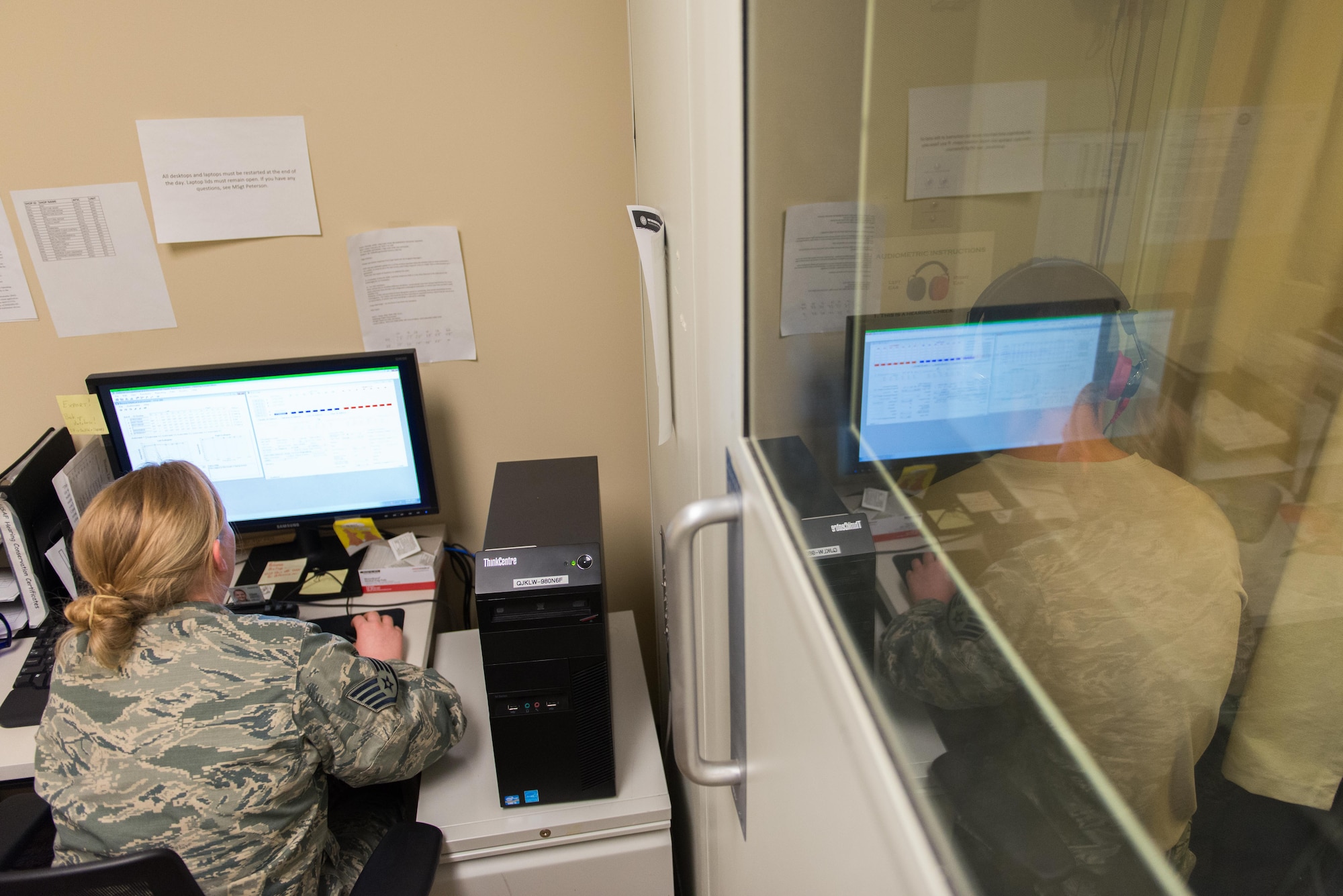 Staff Sgt. Stephanie Ward, 934 ASTS medical technician, administers hearing tests as a part of mass physicals on April 2. 