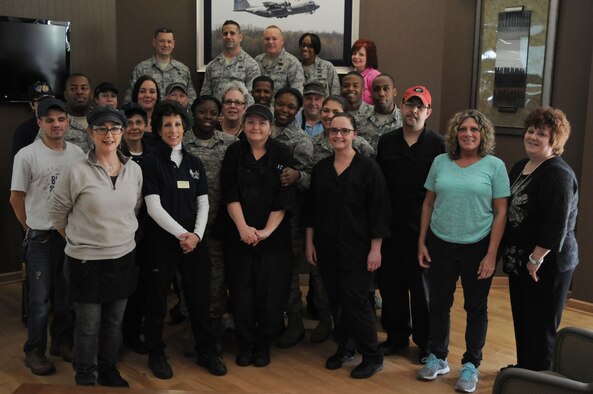 Staff members of the Community Activities Center (CAC), the 910th Sustainment Services Flight Chief and 910th Force Support Squadron (FSS) leadership gather for a group photo during a 910th FSS commander’s call at the CAC here, April 2, 2017. The YARS CAC staff was recognized during the event for winning the 2016 Air Force Reserve Command Award for Food Operations Program of the Year. (U.S. Air Force photo/Senior Airman Joshua Kincaid)