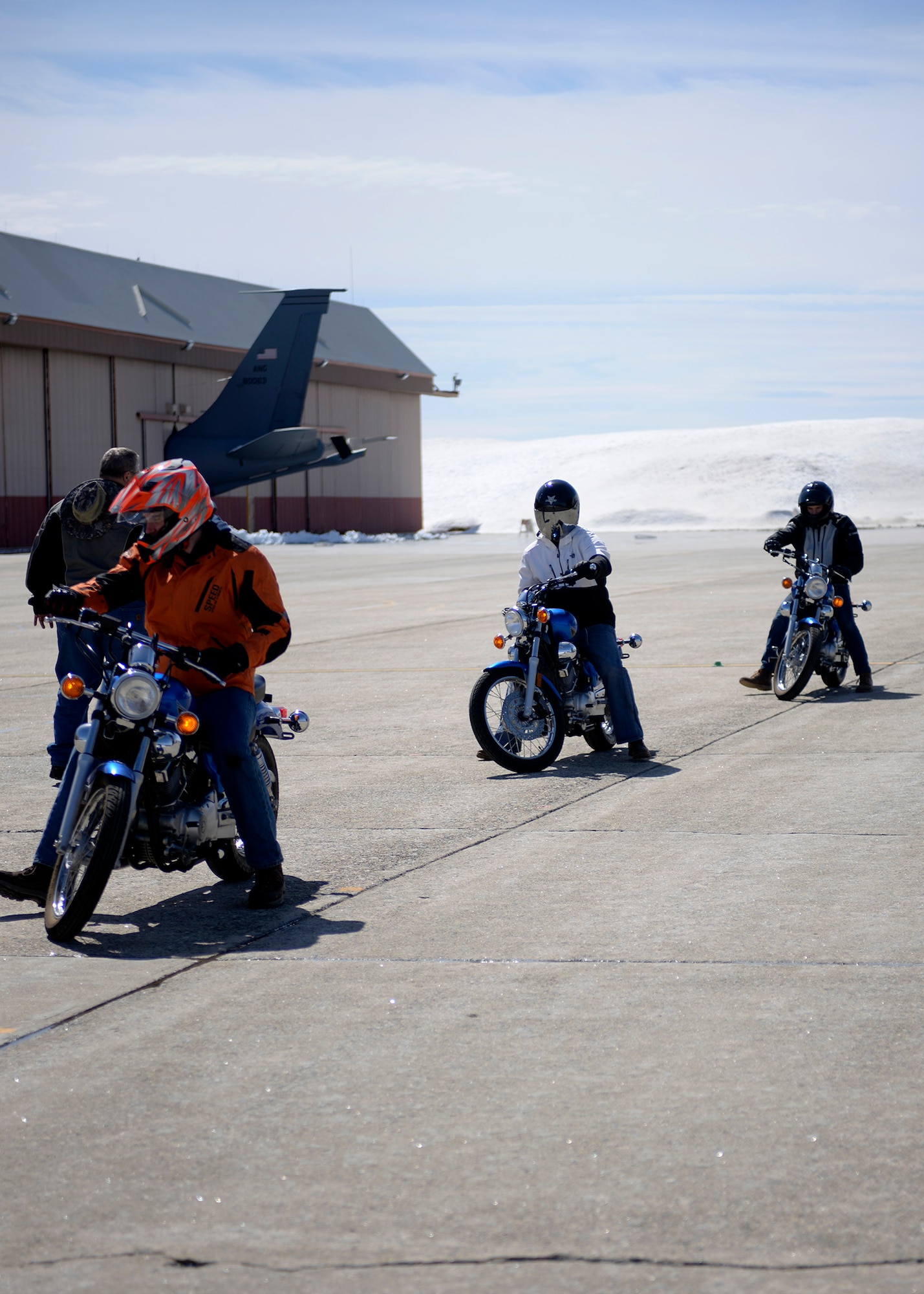 Students of a beginner motorcycle course held at Pease Air National Guard Base, N.H. learn how to park their bikes April 3, 2017.