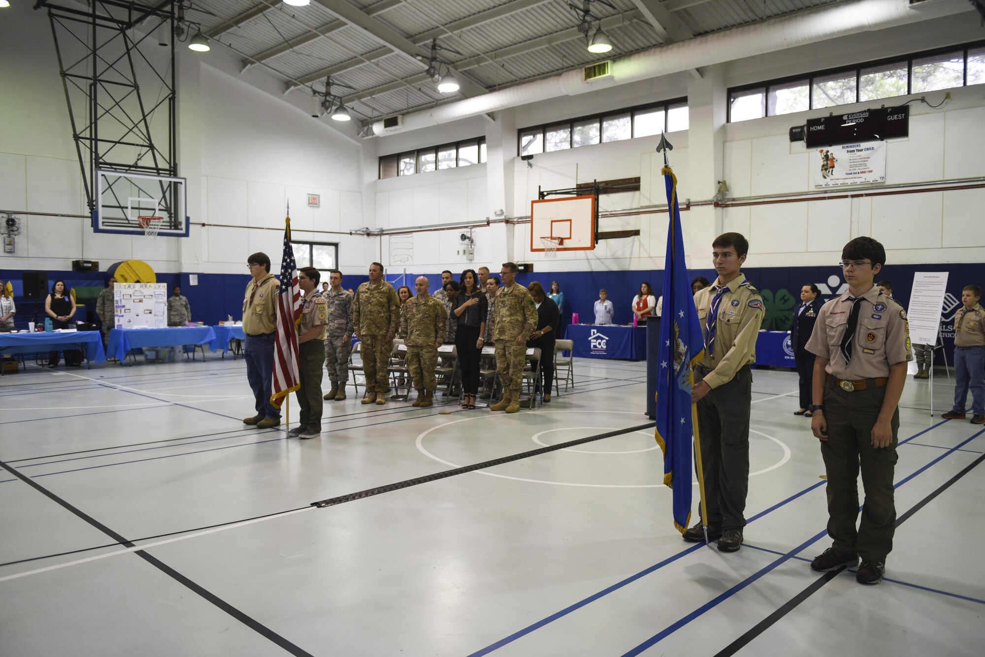 Boy Scouts of America Troop 509 present the colors during the Month of the Military Child and Child Abuse Prevention Month proclamation signing ceremony at the Youth Center, Hurlburt Field, Fla., April 3, 2017. April is designated as the MOMC, underscoring the important role military children play in the armed forces community. (U.S. Air Force photo by Senior Airman Jeff Parkinson)