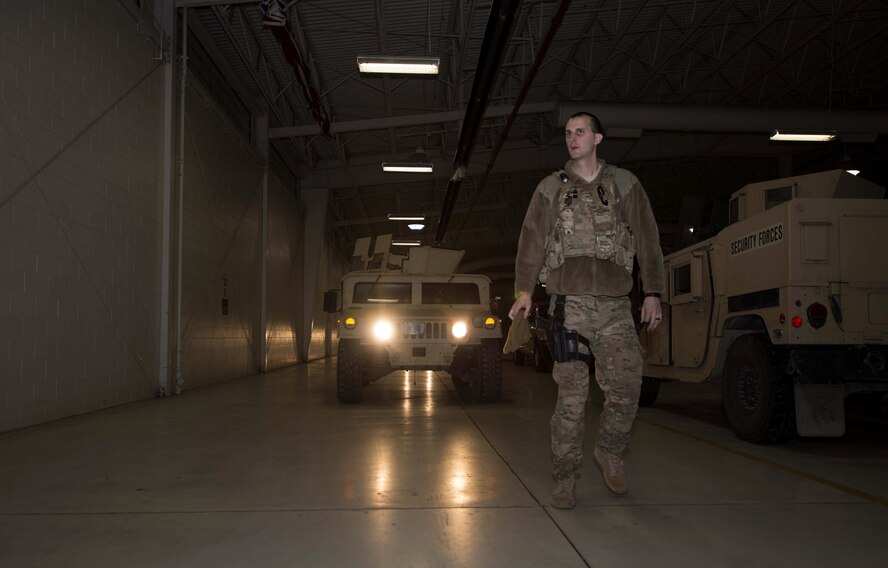 Senior Airman Michael Ripple, 791st Missile Security Forces Squadron response force leader, guides a Humvee at Minot Air Force Base, N.D., Mar. 28, 2017. Inspections are done by the Airmen checking out a vehicle for use. (U.S. Air Force photo/Airman 1st Class Austin M. Thomas)