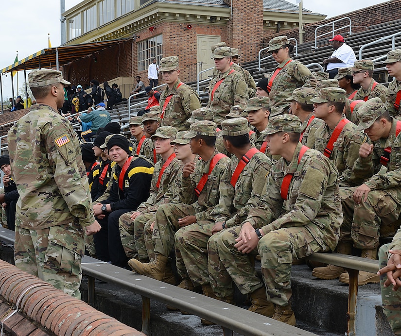 U.S. Army 1st Sgt. Andy Hardy, Echo Company, 266th Quartermaster Battalion, 23rd Quartermaster Brigade first sergeant, assigns Advanced Individual Training students to various stations during a track and field meet at the College of William and Mary in Williamsburg, Va., April 1, 2017. During the event, Soldiers volunteered at different stations to provide support and to build esprit de corp. (U.S. Air Force photo/Staff Sgt. Teresa J. Cleveland)