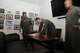The 9th Attack Squadron commander signs the Reaper Armistice Agreement in the presence of the 6th Attack Squadron commander, and the 29th Attack Squadron commander, March 31, 2017, at Holloman Air Force Base, N.M. The Reaper Armistice Agreement is an esprit de corps arrangement between the three squadrons that marks the neutral time when the capture of non-mission essential belongings from a different attack squadron, in the name of competitive spirit, isn’t allowed at Holloman AFB. (U.S. Air Force photo by Master Sgt. Matthew McGovern)