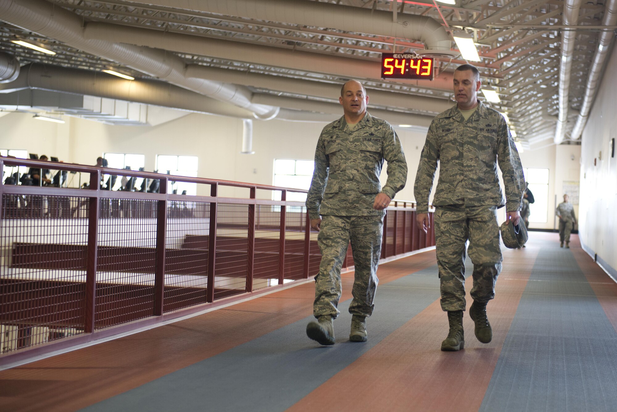 Air Force Col. George T.M. Dietrich III walks at the Sexual Assault Prevention and Response Walk-A-Lap event, March 5 in the Elmendorf Fitness Center. Dietrich walked his own laps after a quick speech. 