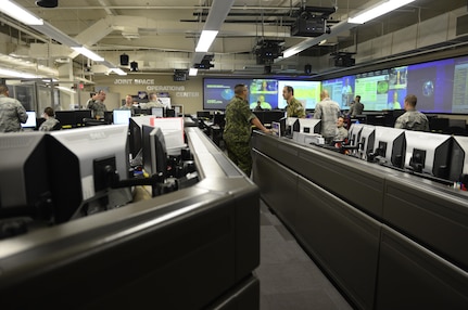 Operators at the Joint Space Operations Center (JSpOC) at Vandenberg Air Force Base, Calif., monitor computer systems designed to detect, track and identify all man-made objects in Earth's orbit in order to maintain space situational awareness.  The JSpOC provides the focal point for the operational employment of worldwide joint space forces and enables the commander of U.S. Strategic Command’s Joint Functional Component Command for Space to integrate space power into global military operations. One of nine Department of Defense unified combatant commands, USSTRATCOM has global strategic missions, assigned through the Unified Command Plan, which include strategic deterrence; space operations; cyberspace operations; joint electronic warfare; global strike; missile defense; intelligence; and analysis and targeting.