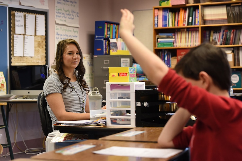 Staff Sgt. Megan Schreder, services craftsman for the 168th Force Support Flight, Alaska Air National Guard, Eielson AFB, Alaska, answers questions from students in her fifth-grade class at Arctic Light Elementary School, Fort Wainwright, Alaska, January, 30, 2017. Schreder, who used her military tuition assistance to pay for college, is in her second year of teaching elementary school students. 