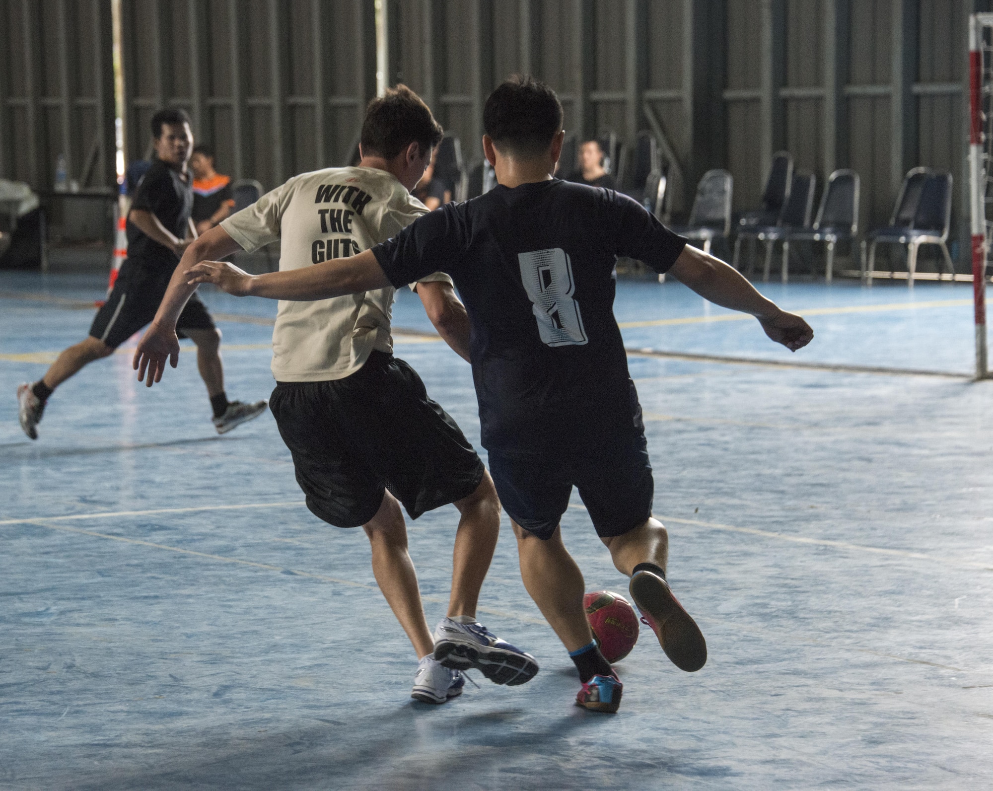 U.S. Air Force Capt. Scott Welshinger, 1st Special Operations Squadron pilot, prepares to score during a soccer game with members of the Royal Thai Air Force 601st Squadron, March 8, 2017 at Don Mueang Air Base, Thailand. In addition to subject-matter expert exchanges on airborne operations, aircraft maintenance and survive, evade, resist and escape (SERE) training, Teak Torch 2017 provided the opportunity to engage with Thai military partners outside the classroom during a sports day event. (U.S. Air Force photo by Capt. Jessica Tait)