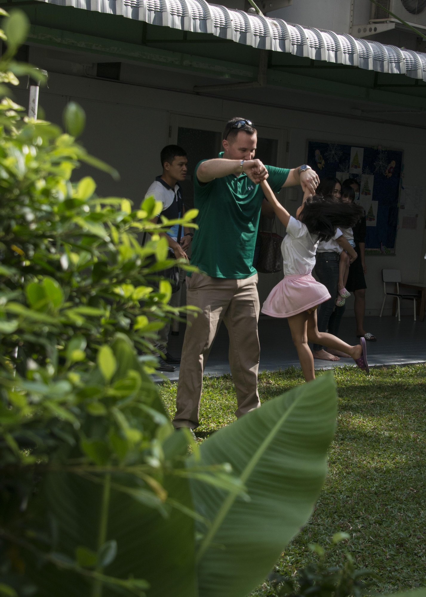 U.S. Air Force Maj. Matthew Howard, Teak Torch 2017 mission commander plays with a child supported by the Thai Red Cross Children’s Home during a community relations event, March 11, 2017 in Bangkok, Thailand. In addition to the donation to support the children’s development, military members from both the 353rd Special Operations Group and 601st Squadron played with the children and helped with renovation projects requested by the orphanage. (U.S. Air Force Capt. Jessica Tait)