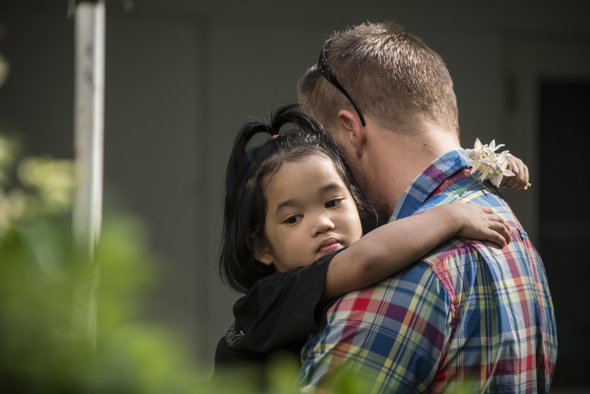 U.S. Air Force Maj. Casey Cunningham, 1st Special Operations Squadron evaluator navigator, holds a child supported by the Thai Red Cross Children’s Home during a community relations event, March 11, 2017 in Bangkok, Thailand. Over $15,000 worth of goods to include computers, appliances, cribs, clothes and food were donated to support the children’s development. (U.S. Air Force photo by Capt. Jessica Tait)